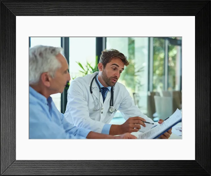 Framed Print : Hospital, doctor and men with clipboard in consultation for health insurance Framed Print : Hospital, doctor and men with clipboard in consultation for health insurance