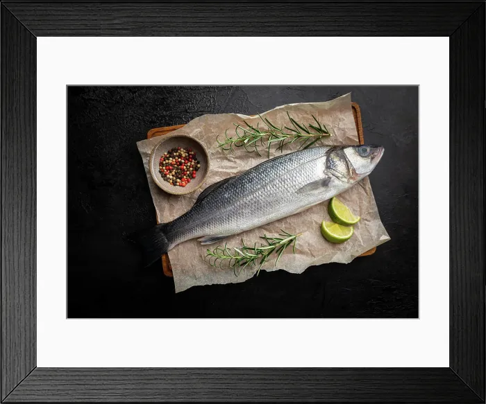 Framed Print : Roher Wolfsbarsch Raw seabass fish with rosemary and spices on dark background Framed Print : Roher Wolfsbarsch Raw seabass fish with rosemary and spices on dark background