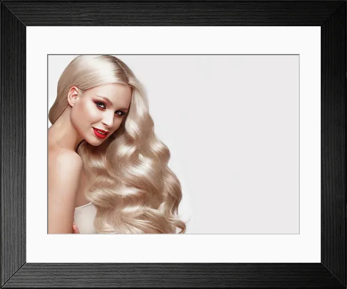 Framed Print : Beautiful blonde in a Hollywood manner with curls Framed Print : Beautiful blonde in a Hollywood manner with curls