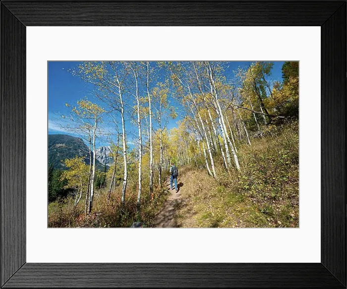 Framed Print : Young man on the hiking trail to Taggart Lake Framed Print : Young man on the hiking trail to Taggart Lake