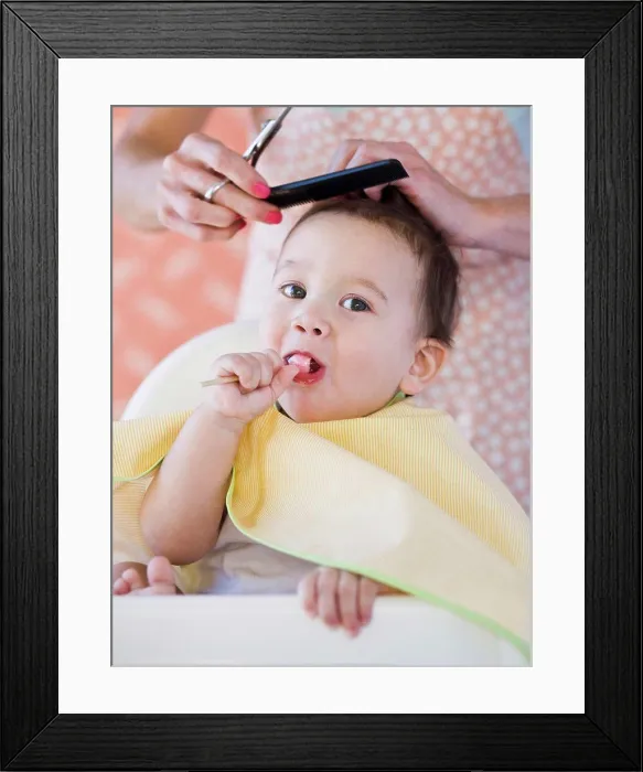 Framed Print : Baby getting a haircut Framed Print : Baby getting a haircut