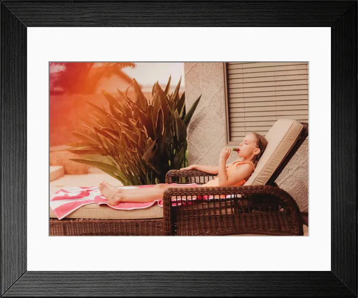 Framed Print : Girl enjoying cool popsicle on hot summer day Framed Print : Girl enjoying cool popsicle on hot summer day