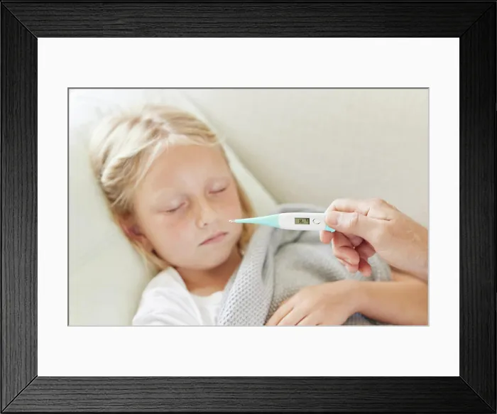 Framed Print : Parents, child and thermometer for symptoms Framed Print : Parents, child and thermometer for symptoms