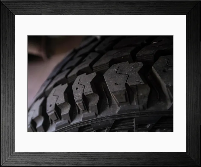 Framed Print : Offroad tire tread ready to be mounted on the car Framed Print : Offroad tire tread ready to be mounted on the car