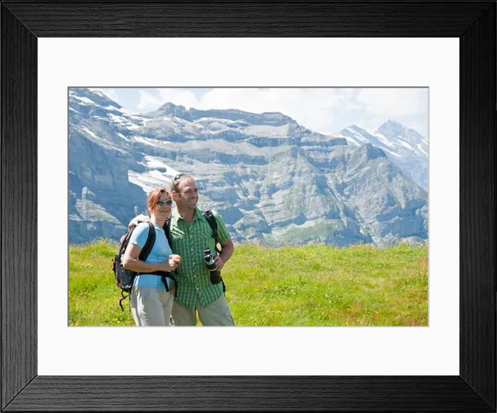 Framed Print : Couple Looking at View, Bernese Oberland, Switzerland Framed Print : Couple Looking at View, Bernese Oberland, Switzerland