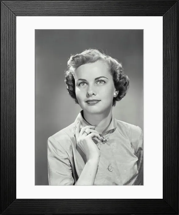 Framed Print : Vintage photograph. Portrait of young woman looking up