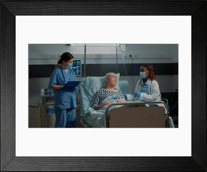 Framed Print : Multi ethnic medical personnel monitoring patient health Framed Print : Multi ethnic medical personnel monitoring patient health