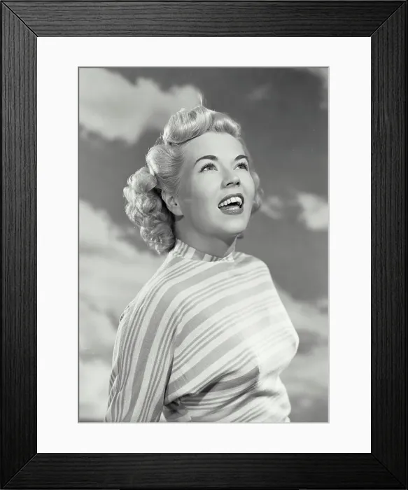 Framed Print : Vintage photograph. Portrait of woman in striped blouse smiling off camera Framed Print : Vintage photograph. Portrait of woman in striped blouse smiling off camera
