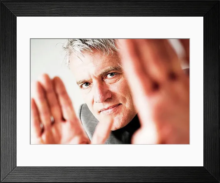 Framed Print : Businessman gesticulating defensively Framed Print : Businessman gesticulating defensively