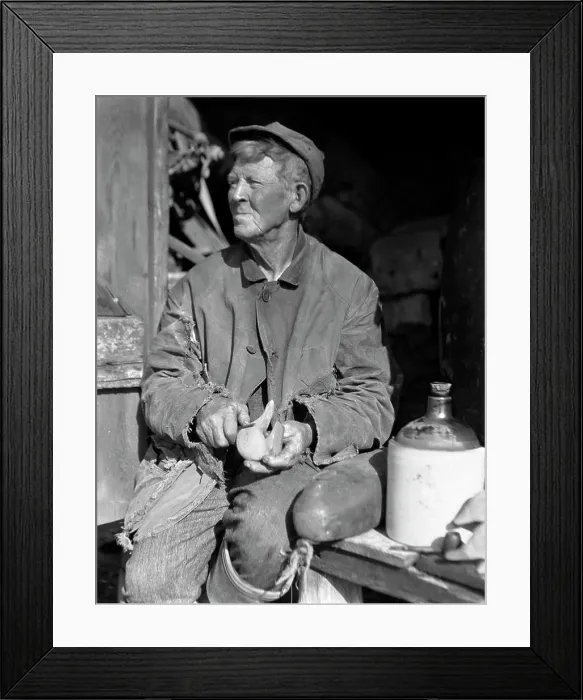 Framed Print : 1920S 1930S Elderly Man Weathered Face Sitting Beside Jug Carving Duck Decoy Framed Print : 1920S 1930S Elderly Man Weathered Face Sitting Beside Jug Carving Duck Decoy