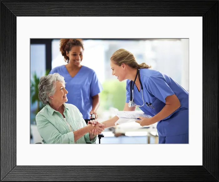 Framed Print : Handshake, nurse smile and senior woman in wheelchair with medical results and surgery success news Framed Print : Handshake, nurse smile and senior woman in wheelchair with medical results and surgery success news