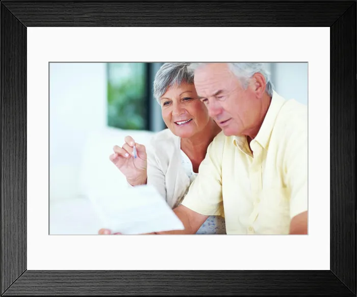 Framed Print : Happy, mature couple and reading with bills for finance Framed Print : Happy, mature couple and reading with bills for finance