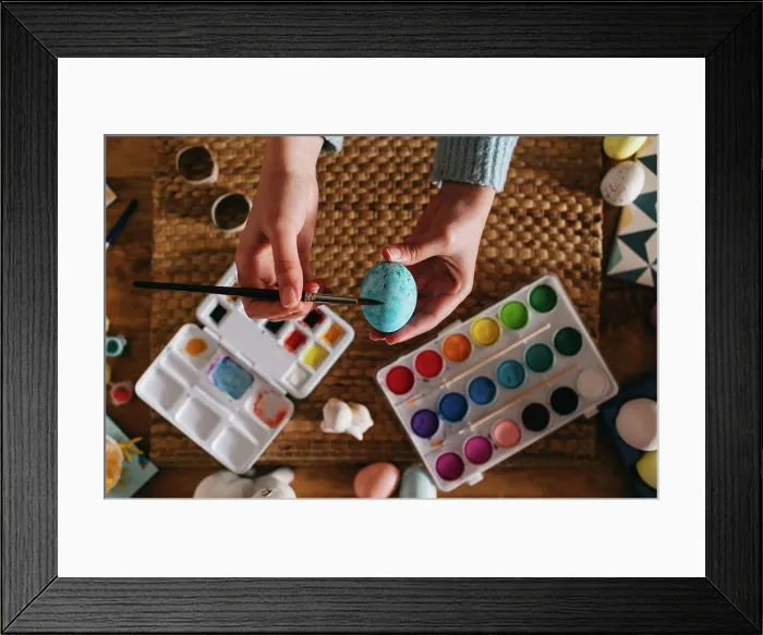 Framed Print : From above top view of cropped unrecognizable person in sweater covering fresh chicken eggs with blue paint while Framed Print : From above top view of cropped unrecognizable person in sweater covering fresh chicken eggs with blue paint while