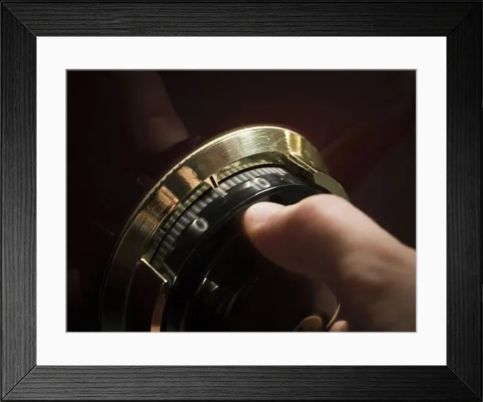 Framed Print : Hand opening combination lock