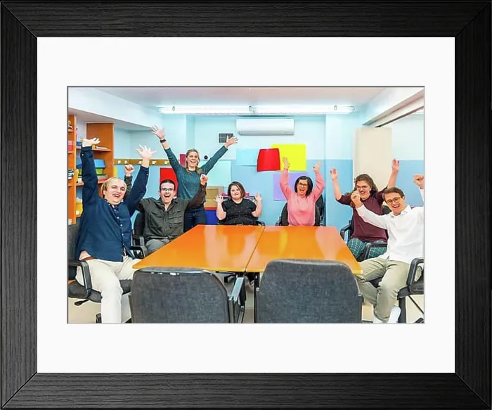 Framed Print : Portrait of happy joyful people with special needs in a class with teacher Framed Print : Portrait of happy joyful people with special needs in a class with teacher