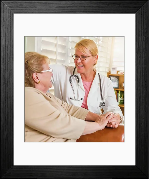 Framed Print : Happy smiling doctor or nurse talking to senior woman in chair at home Framed Print : Happy smiling doctor or nurse talking to senior woman in chair at home