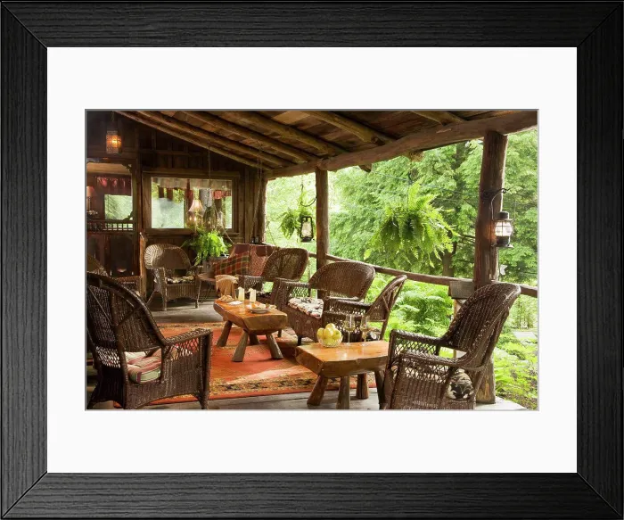 Framed Print : Wicker tables and chairs set on veranda of timber house Framed Print : Wicker tables and chairs set on veranda of timber house