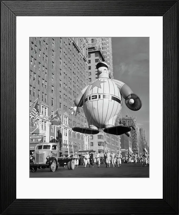 Framed Print : USA, New York State, New York City, Macy's Thanksgiving Day Parade holding baseball player balloon, 1946