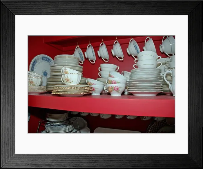 Framed Print : Close-up of antique floral patterned china plates and cups Framed Print : Close-up of antique floral patterned china plates and cups