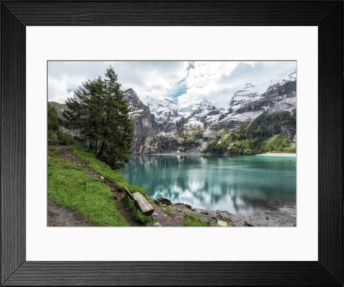 Framed Print : Oeschinensee Lake Bench The view of Oeschinenee Lake and Oeschinen valley amongst Bernese Alps mountain tops