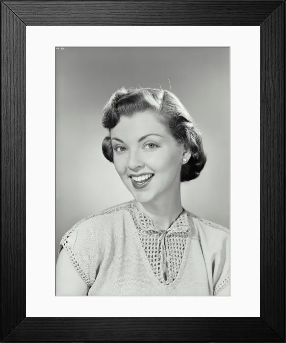Framed Print : Vintage photograph. Portrait of young woman smiling. Model released Framed Print : Vintage photograph. Portrait of young woman smiling. Model released