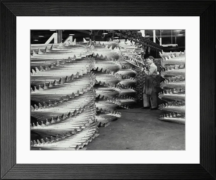 Framed Print : Vintage photograph. Aluminum window frames are stacked in Louisville, Kentucky plant of the Reynolds Metals Co