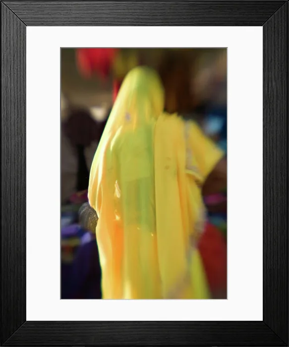 Framed Print : INDIA, Rajasthan, Pushkar: PUSHKAR CAMEL FAIR, Yellow Sari / Pushkar Village / Defocussed Framed Print : INDIA, Rajasthan, Pushkar: PUSHKAR CAMEL FAIR, Yellow Sari / Pushkar Village / Defocussed