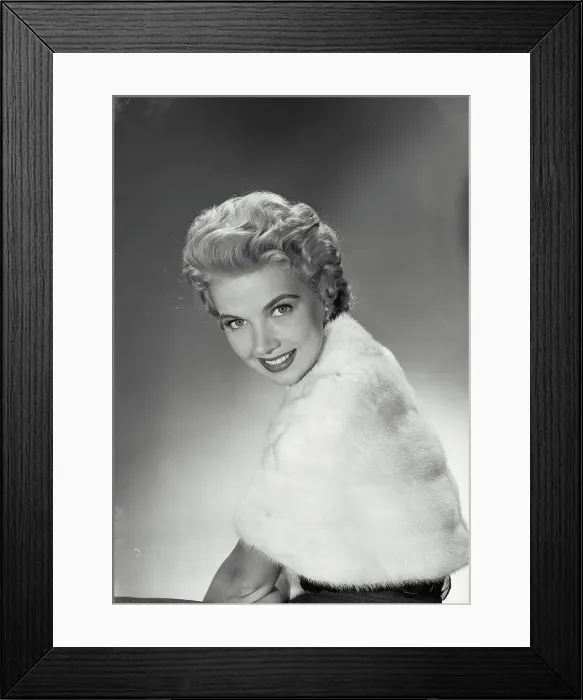Framed Print : Vintage Photograph. June Kirby. Model Released. Portrait of woman in fur jacket smiling. Frame 1 Framed Print : Vintage Photograph. June Kirby. Model Released. Portrait of woman in fur jacket smiling. Frame 1