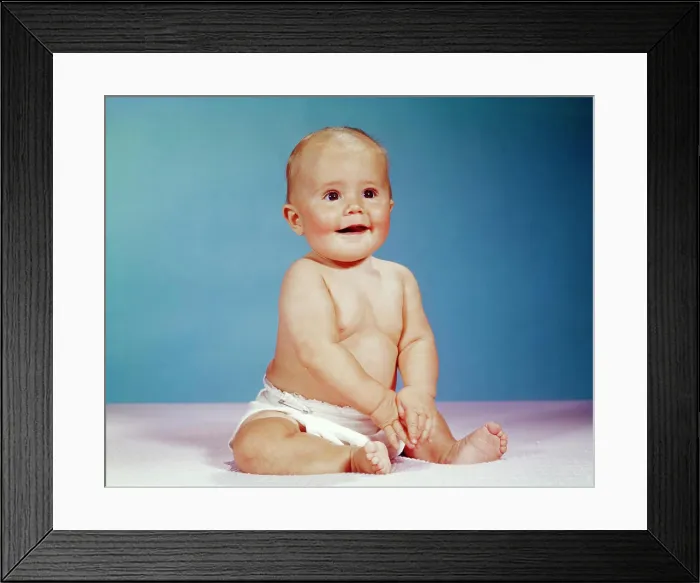 Framed Print : 1960s PORTRAIT OF SMILING BABY GIRL SITTING UPRIGHT WEARING CLOTH DIAPER Framed Print : 1960s PORTRAIT OF SMILING BABY GIRL SITTING UPRIGHT WEARING CLOTH DIAPER