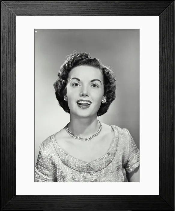 Framed Print : Vintage photograph. Portrait of young woman smiling. Model released Framed Print : Vintage photograph. Portrait of young woman smiling. Model released