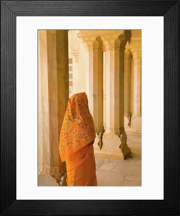 Framed Print : Beautiful graphic arches with colorful Hindu gentle woman posed at Amber Fort temple in Rajasthan Jaipur India (MR) Framed Print : Beautiful graphic arches with colorful Hindu gentle woman posed at Amber Fort temple in Rajasthan Jaipur India (MR)