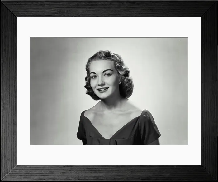 Framed Print : Vintage Photograph. A portrait of a young woman smiling Framed Print : Vintage Photograph. A portrait of a young woman smiling