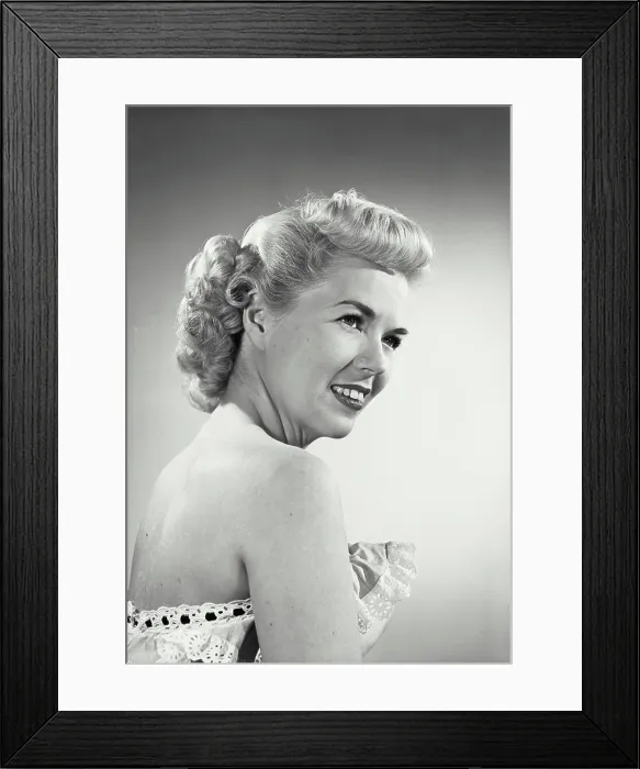 Framed Print : Vintage photograph. woman in strapless dress smiling off camera Framed Print : Vintage photograph. woman in strapless dress smiling off camera