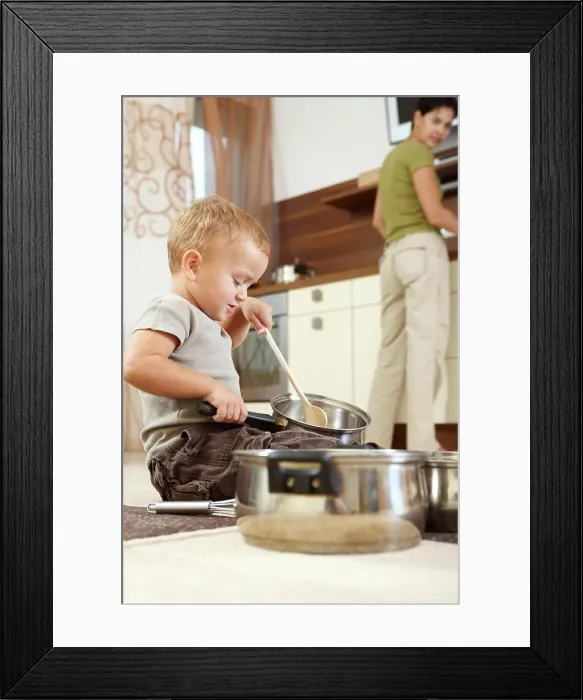 Framed Print : Little boy playing with cooking pots Little boy sitting on carpet in kitchen playing with cooking pots Framed Print : Little boy playing with cooking pots Little boy sitting on carpet in kitchen playing with cooking pots