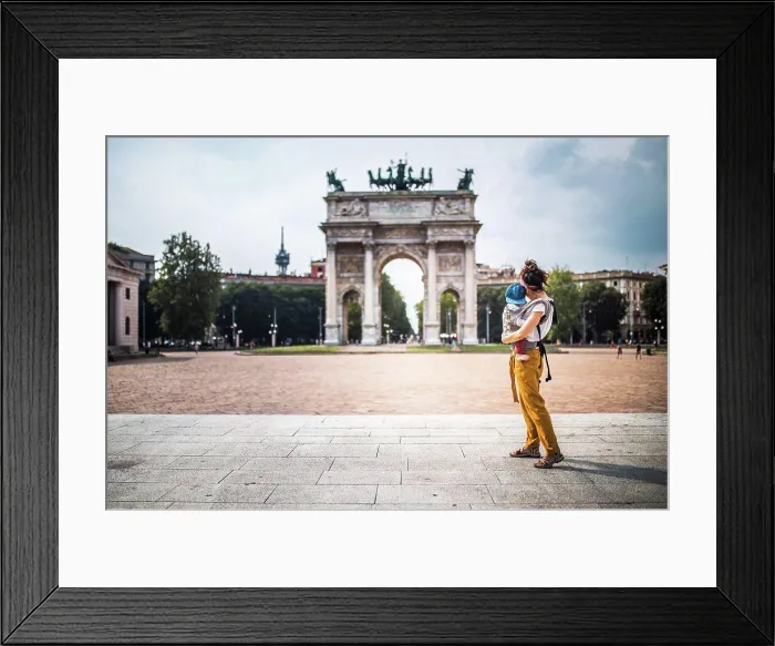 Framed Print : Mother carrying her baby visiting Milan