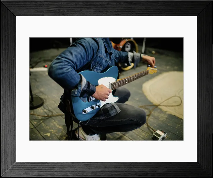 Framed Print : Young guitarist tunes at thr concert Framed Print : Young guitarist tunes at thr concert