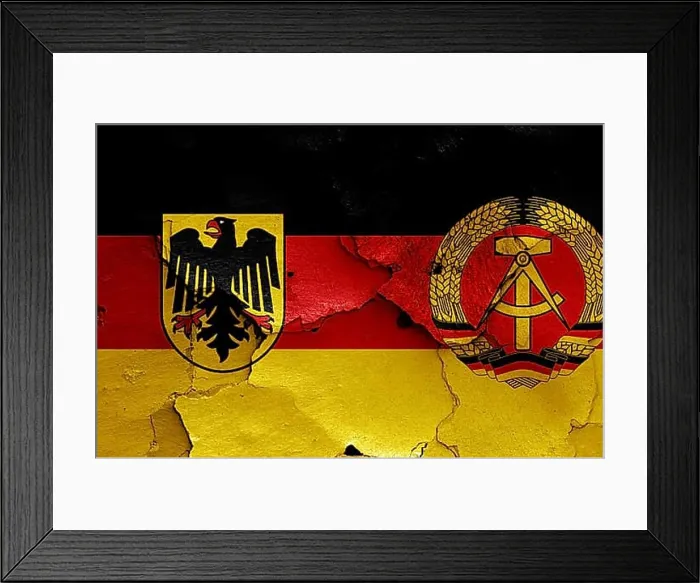 Framed Print : Historical flags of West Germany and East Germany painted on cracked wall Framed Print : Historical flags of West Germany and East Germany painted on cracked wall