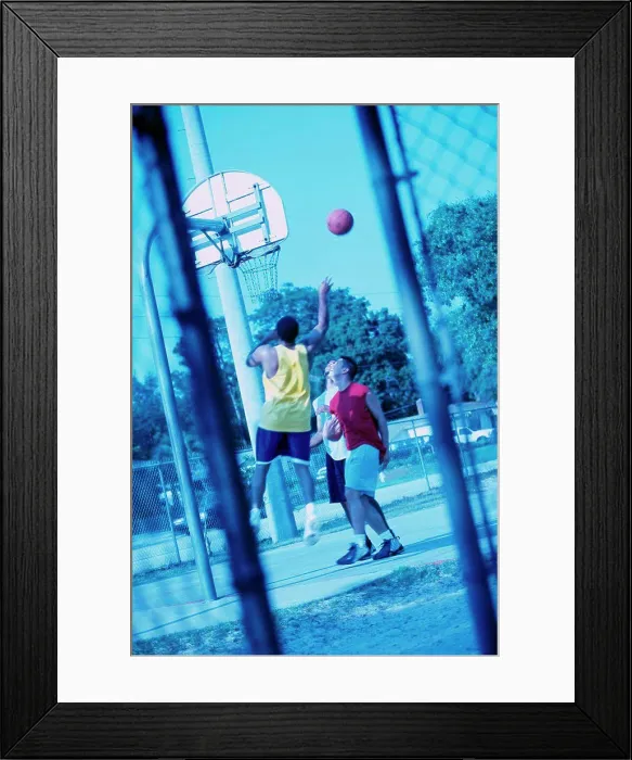 Framed Print : Young men playing basketball Framed Print : Young men playing basketball