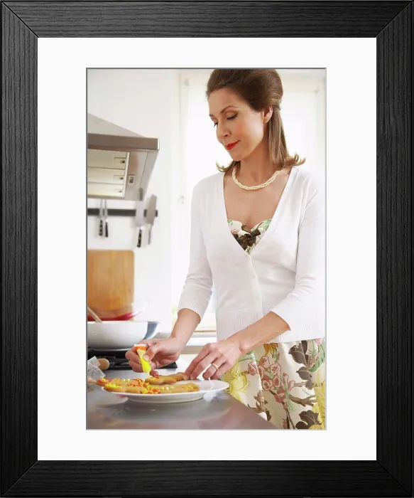 Framed Print : Woman Decorating Cookies Framed Print : Woman Decorating Cookies