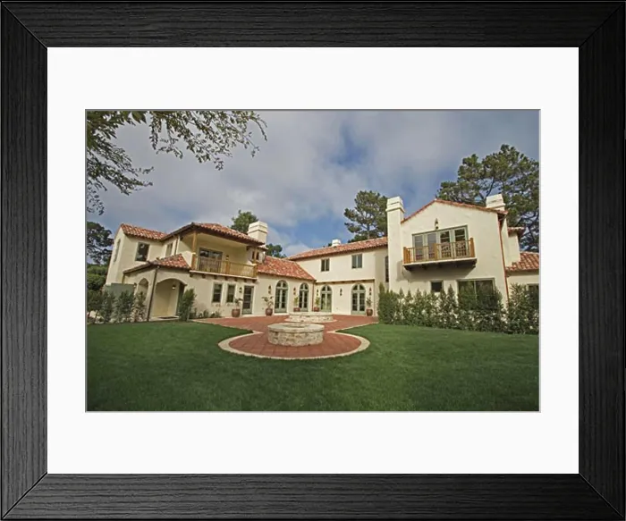 Framed Print : Exterior of a SPANISH STYLE LUXURY HOME with stucco walls and red tile roof