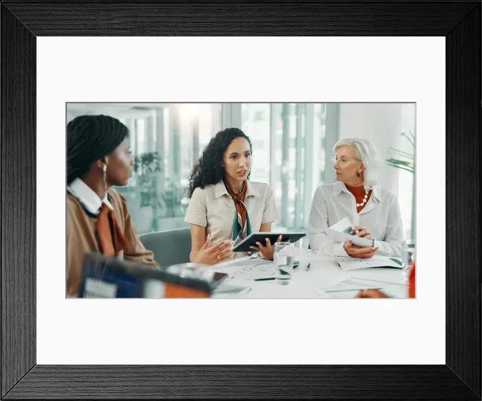 Framed Print : Explain, meeting and tablet with business women in boardroom of office for planning or strategy Framed Print : Explain, meeting and tablet with business women in boardroom of office for planning or strategy