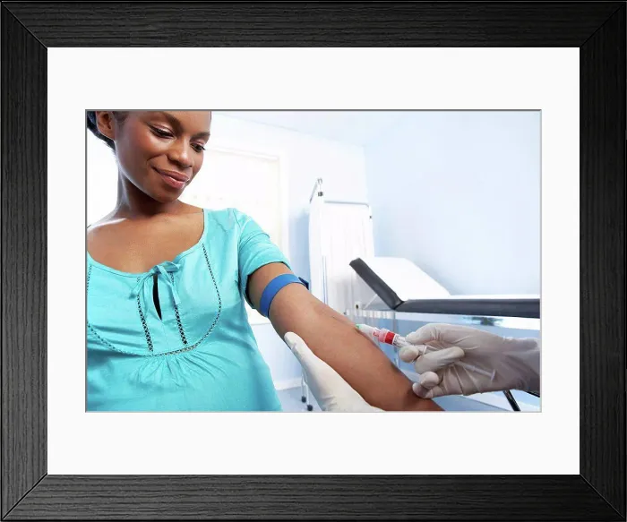 Framed Print : Obstetric examination Framed Print : Obstetric examination