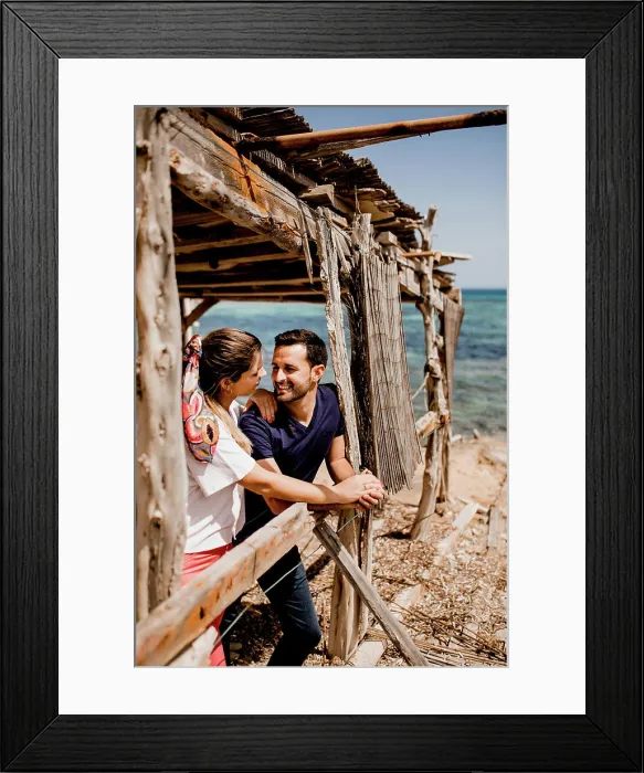 Framed Print : Couple cuddling on waterside Framed Print : Couple cuddling on waterside