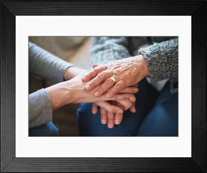 Framed Print : Old person, friend and holding hands for comfort on sofa for grief loss or support Framed Print : Old person, friend and holding hands for comfort on sofa for grief loss or support