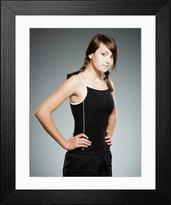 Framed Print : Teenage girl smiling with hands on hips