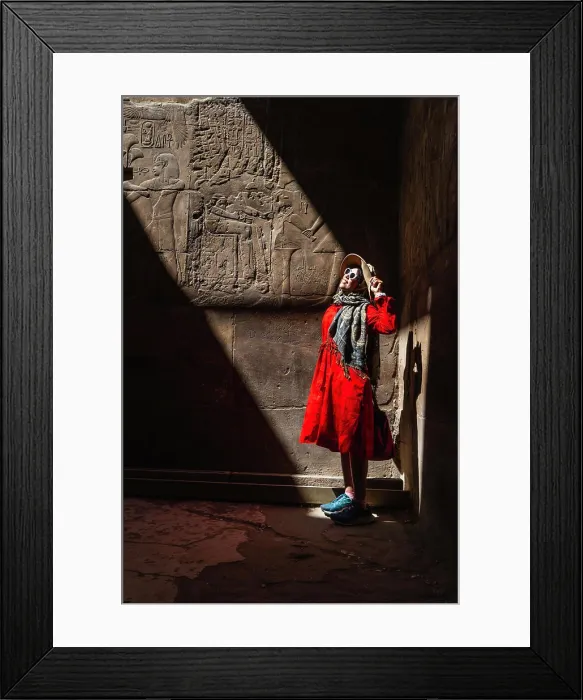 Framed Print : Tourist admiring the ancient temple in Luxor - Egypt
