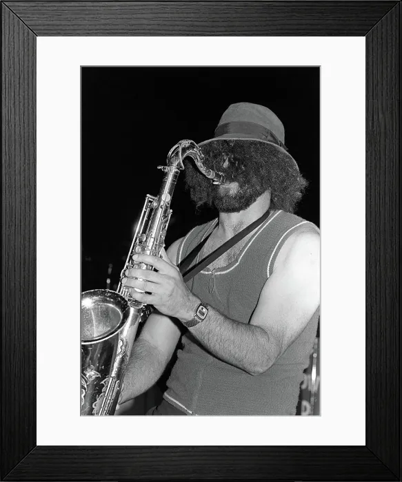 Framed Print : A saxophone player solos as the Navy show band performs during exercise Unitas XX Framed Print : A saxophone player solos as the Navy show band performs during exercise Unitas XX