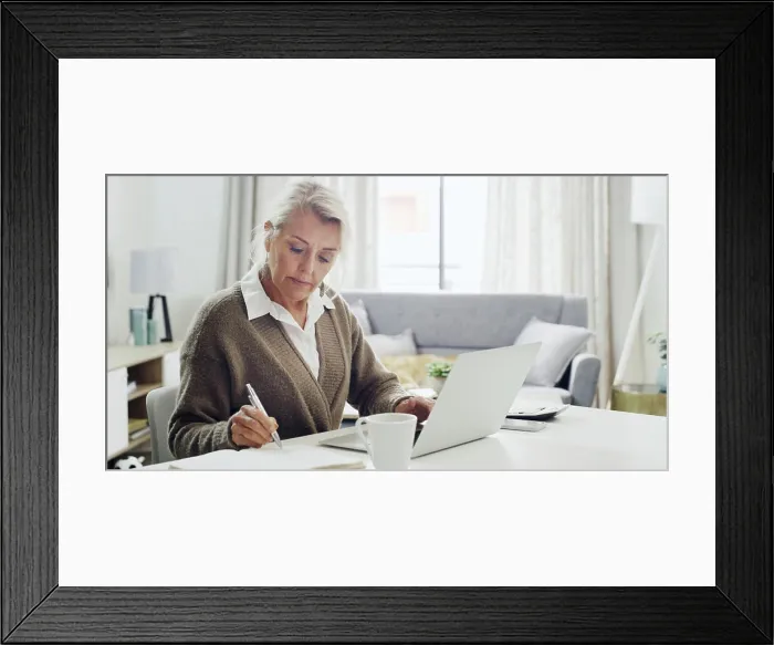 Framed Print : Laptop, remote work and writing with woman in living room of home for notes Framed Print : Laptop, remote work and writing with woman in living room of home for notes