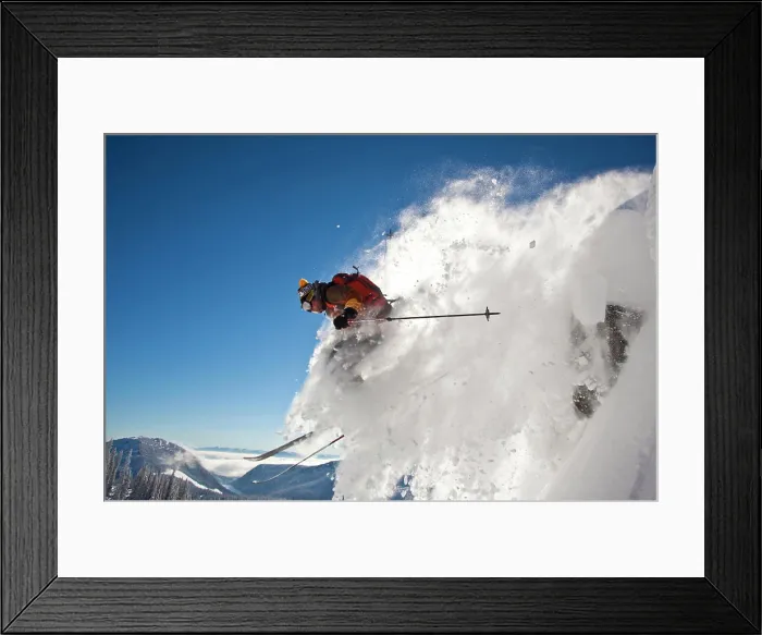 Framed Print : A male backcountry skier drops a cliff while out ski touring, Sol Mountain, Monashee Backcountry, Revelstoke, BC