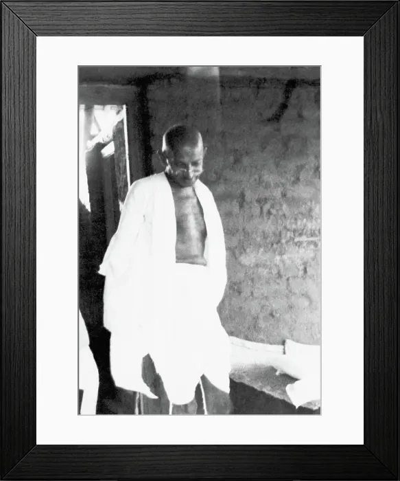 Framed Print : Mahatma Gandhi, listening to others in his hut at Sevagram Ashram